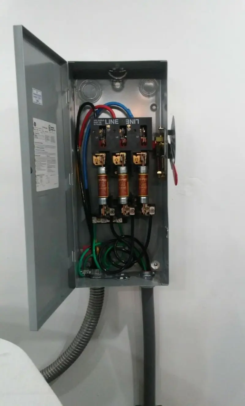 Three-phase disconnect switch installed for Smoke Detector Installation in Loyola