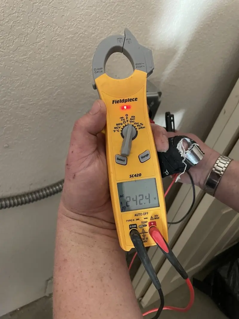 Voltage testing with clamp meter during Generator Installation in Loyola